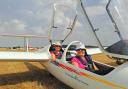Beccy and Liisi in a glider.