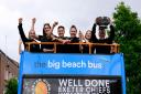 Exeter Chiefs Women Team lift the Allianz Cup during the Exeter Chiefs Women Team Allianz Cup winners open top bus parade through the streets of Exeter on 6 June 2022. Photo: Phil Mingo/PPAUK