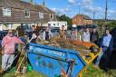 Volunteers clearing the communal garden area at Millwey Rise, Axminster. Picture: supplied