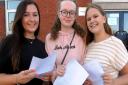 Three of Axe Valley Academy’s top performers with their GCSE results (l/r) Louise Tyne, of Seaton, Ellie King, of Axminster and Jess Richards, from Chardstock, all aged 16. Picture Chris Carson