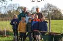 Head of School, Christopher Threlfall, with Will Wilding and pupils
