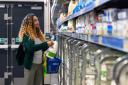 Tesco is phasing out six-pint bottles of milk due to higher levels of waste.