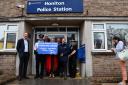The PCC with local MP Richard Foord, the town mayor and police at Honiton Police Station