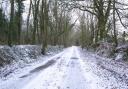Light snow settled on country lanes such as here in East Hill. Picture: Simon Horn