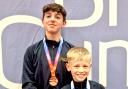 Coen and Oscar with their bronze medals