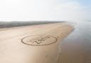 Sand art representing the lives lost on Devon and Cornwall's roads last year