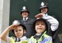 Officers and their sons at one of many pass out ceremonies held for new officers in 2023
