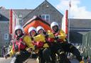 Lyme Regis lifeboat crew doing a conga