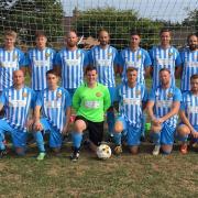 Lympstone Football Club at the start of a new season; Back row (left to right). Club president Mike Hoyle, H Sumner, B Branton, J Pond, R Higham, D Radford, P Mcmahon (c) S Schlaefli, M Dunne, A Lowe, M Delahaye Front row ((left to right)  Wilson,  K
