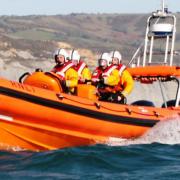 Lyme Regis RNLI save someone trapped in mud at Charmouth