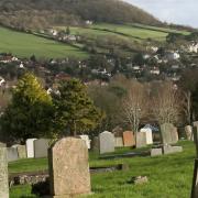 A view of Sidmouth Cemetery with Salcombe Hill behind.