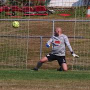 The Elburton Villa goalkeeper is beaten by a shot from Honiton Town's Dan Tavender