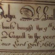 THe 333-year-old book at Allhallows Museum