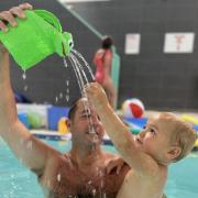 Parent and toddler swimming