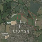 The areas highlighted in red are where the homes will be built in Seaton.