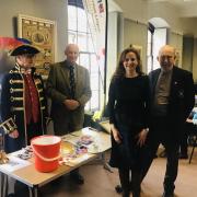 Axminster’s town crier Nick Goodwin with Chairman Peter Slimon, Gina K Youens and Reverend Clive .