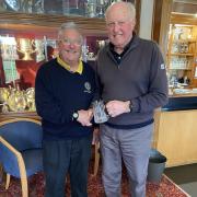 Seniors Captain Rob Graham and Jim Wallis with his hole in one Trophy