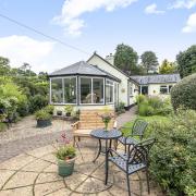The three-bedroom detached bungalow occupies a plot of around a quarter of an acre  Pictures: Gordon & Rumsby