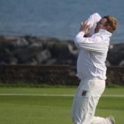 Sidmouth bowler Charlie Miles