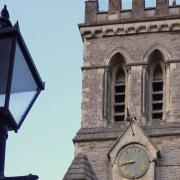 The tower and clock of St Michael's Church, Beer