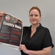 Alison Hernandez with a poster raising awareness of 'county lines' operations