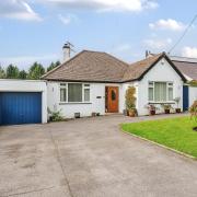 This attractive chalet bungalow is situated on a private cul-de-sac in Uplyme  Pictures: Symonds & Sampson