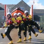 Lyme Regis lifeboat crew doing a conga