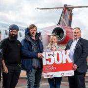 Loganair celebrates milestone customer with first-time flyer