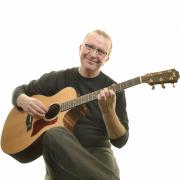 Andy Doran with his guitar ready to play in Beer on September 28.