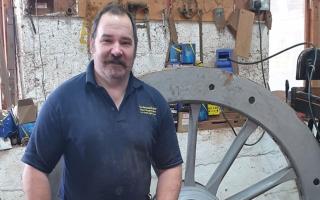 Gregory Rowland in his workshop Mike Rowland & Son Wheelwrights and Coachbuilders, in Colyton.